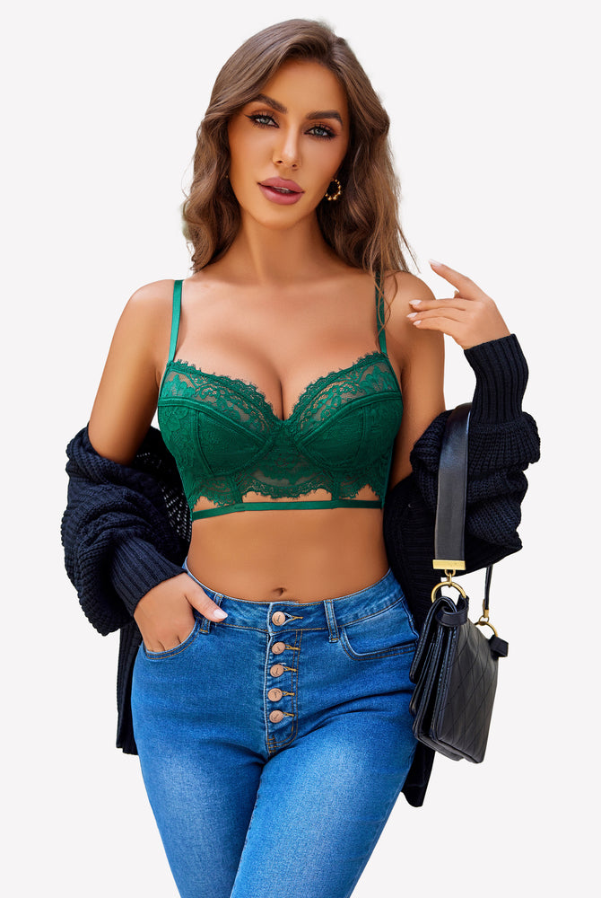 Green lace bra with floral design, adjustable straps, and comfortable fit, paired with blue jeans.