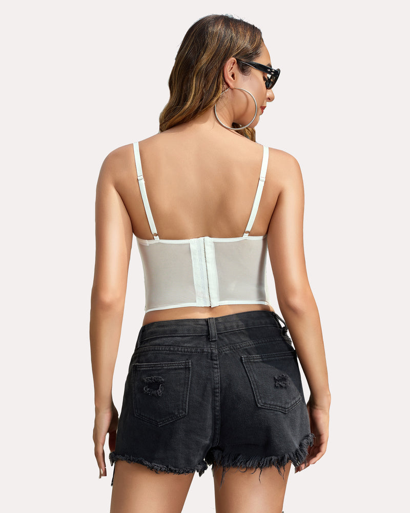White lace corset top with adjustable straps and black denim shorts. Sexy lingerie for women.
