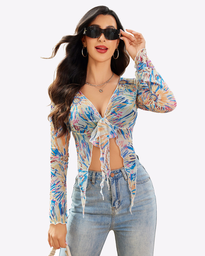 Floral mesh crop top, Y2K style, tie front, with light blue jeans. Sexy lingerie.