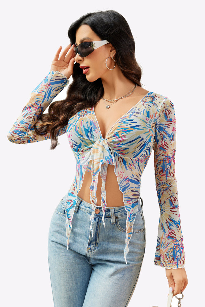 Floral print mesh crop top, Y2K style, tie front, long sleeves, light wash jeans. Sexy lingerie.