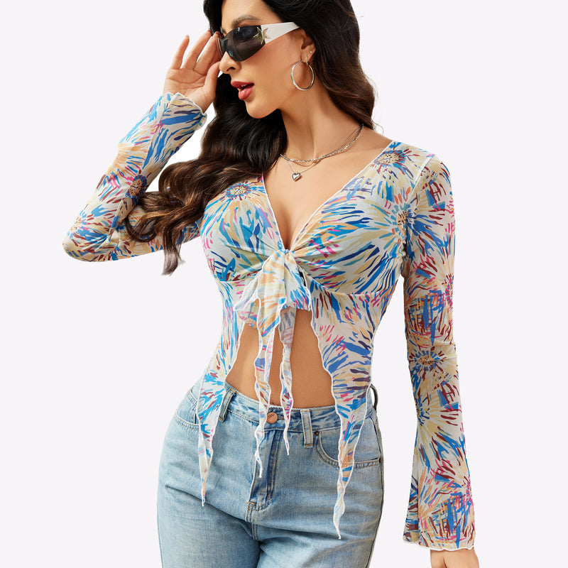 Floral print mesh crop top, Y2K style, tie front, long sleeves, light wash jeans. Sexy lingerie.