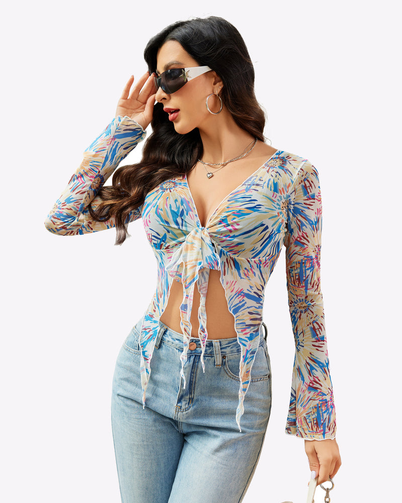 Floral print mesh crop top, Y2K style, tie front, long sleeves, light wash jeans. Sexy lingerie.