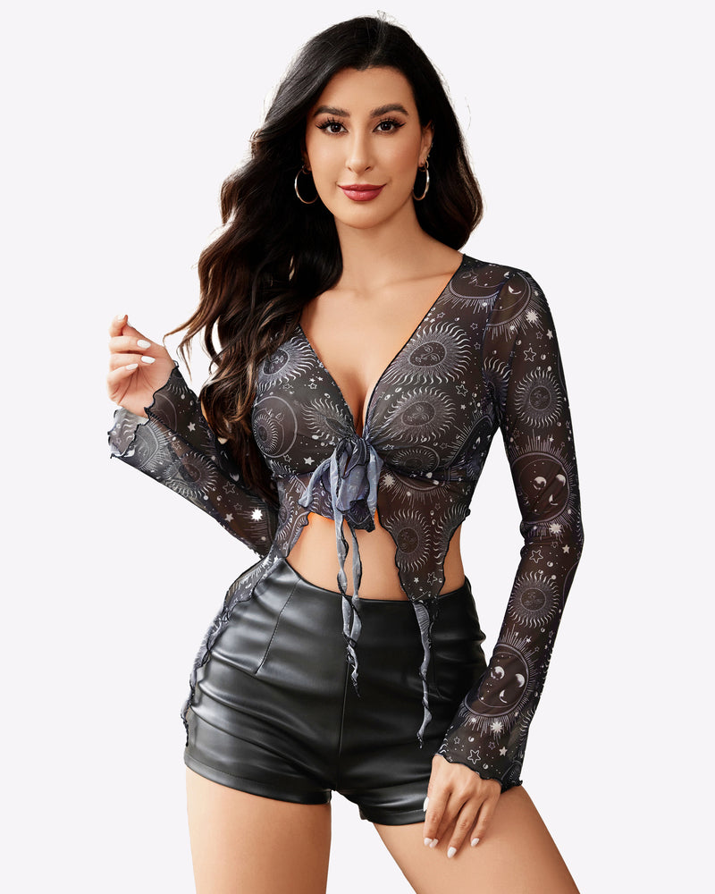 Mesh crop top, tie front detail with celestial print, black shorts. Perfect for Y2K fashion.
