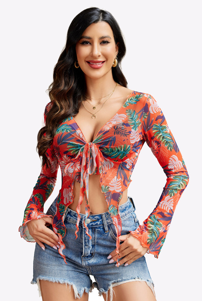 Y2K floral mesh crop top, tie front and long sleeves. Paired with denim shorts. Sexy lingerie.