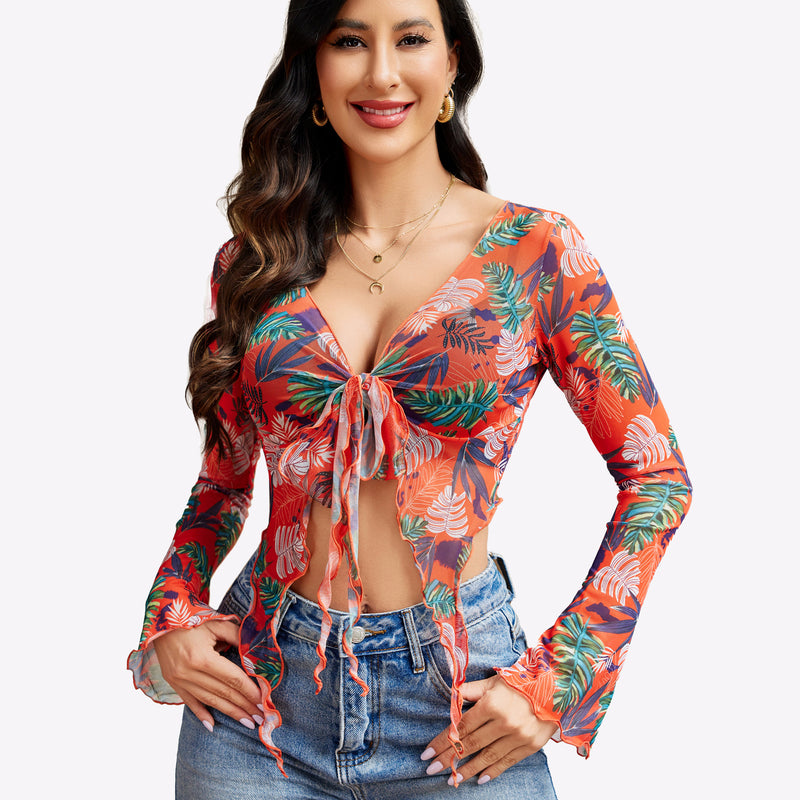 Y2K floral mesh crop top, tie front and long sleeves. Paired with denim shorts. Sexy lingerie.