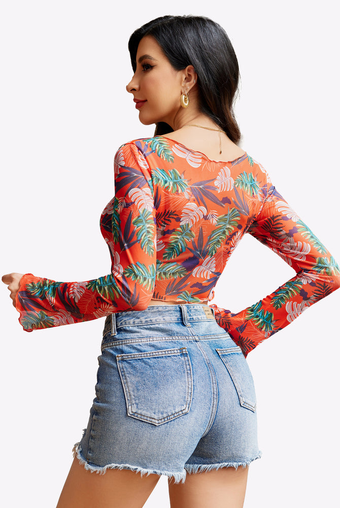 Y2K floral mesh crop top with long sleeves and denim shorts. Sexy lingerie. Tie front.