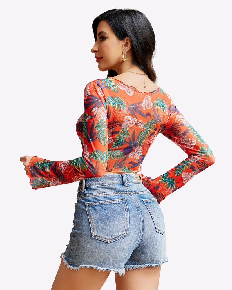 Y2K floral mesh crop top with long sleeves and denim shorts. Sexy lingerie. Tie front.