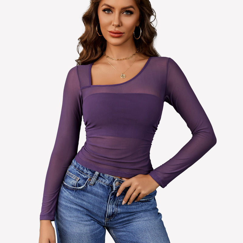 Avidlove purple mesh asymmetrical crop top, showcasing neckline details, with blue jeans.