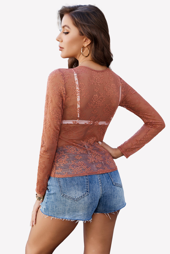 Rust lace mesh top with long sleeves and denim shorts. Festival and party wear. Sheer blouse.