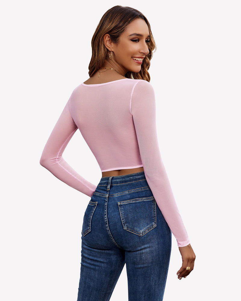 Pink sheer long sleeve crop top with blue jeans - Sexy and comfortable outfit