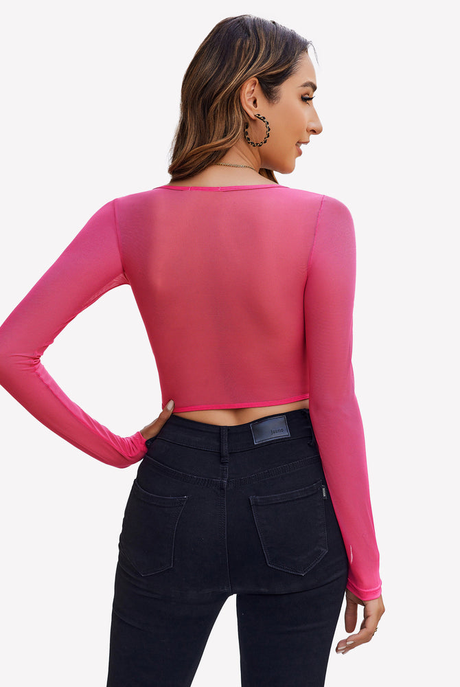Pink sheer long sleeve crop top with black jeans - Sexy and comfortable outfit