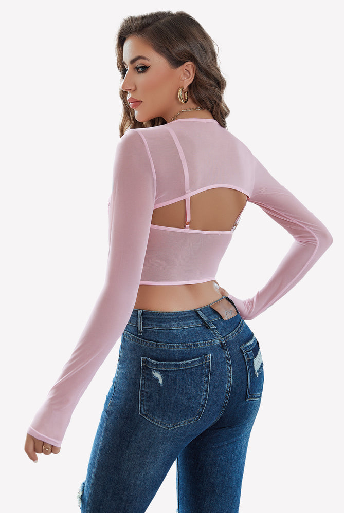 Pink mesh crop top and shrug set with backless design, sexy lingerie, and blue jeans