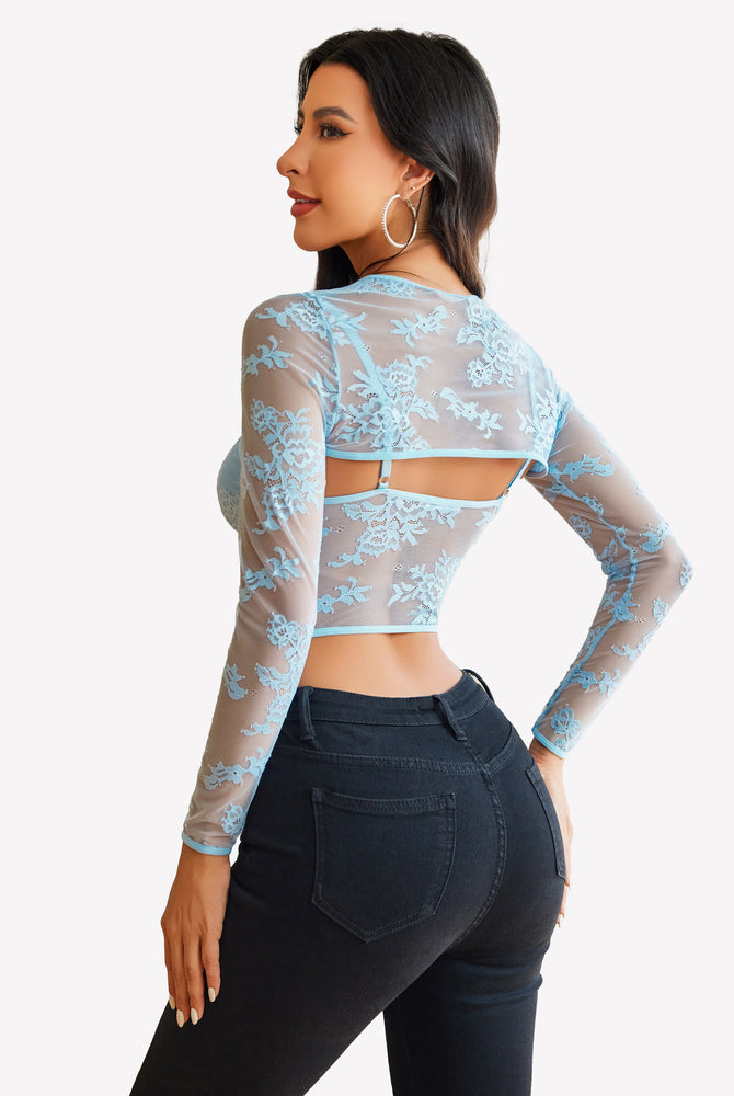 Light blue lace long sleeve cami top and shrug set with black jeans. Sexy lingerie.