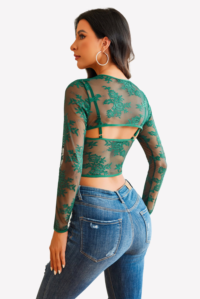 Green lace long sleeve crop top with matching bra and blue jeans. Sexy lingerie for women.