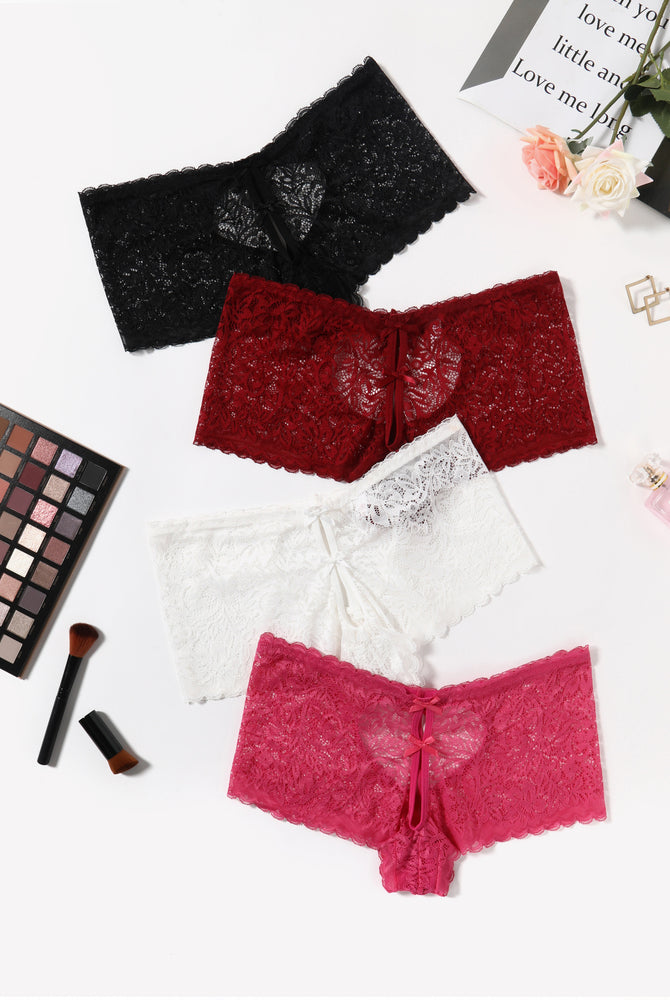 Boy shorts panties in black, red, white, and pink lace, heart design, bow accent