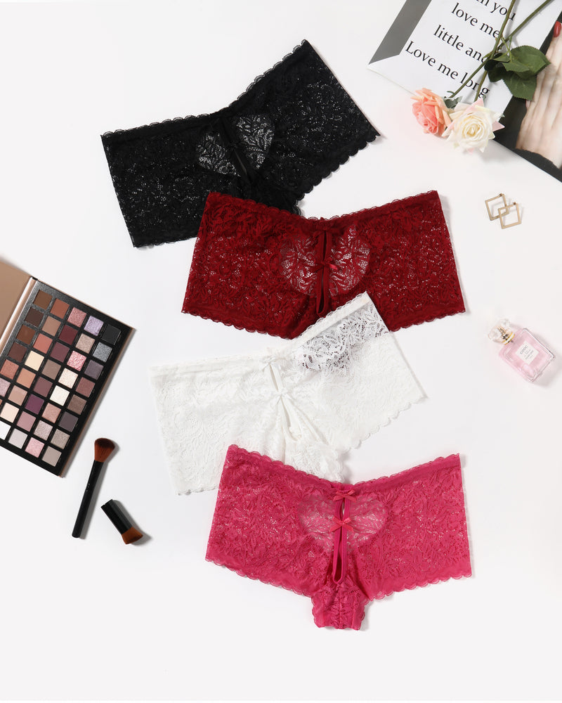 Boy shorts panties in black, red, white, and pink lace, heart design, bow accent