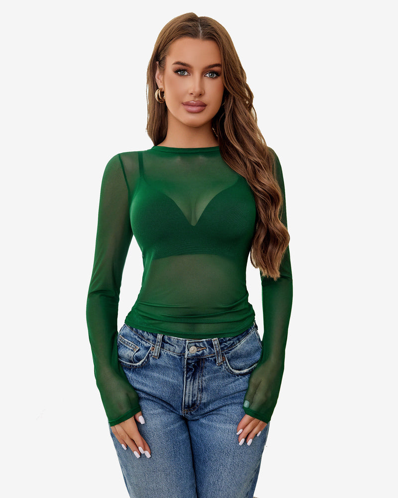 Green sheer blouse with long sleeves paired with denim jeans. Avidlove sexy lingerie.