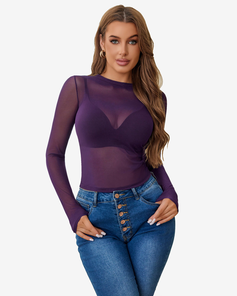 Purple sheer blouse with long sleeves, paired with blue denim jeans. Sexy lingerie style for women.