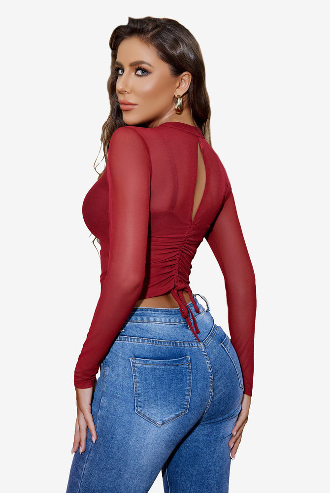 Burgundy sheer blouse with drawstring detail, paired with blue jeans. Avidlove sexy lingerie style.