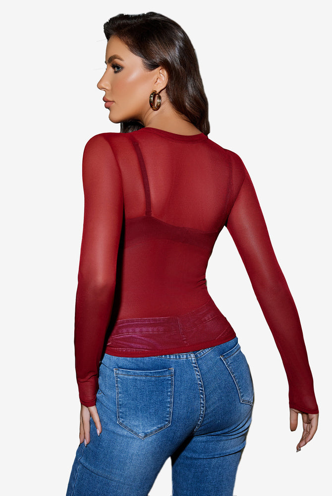 Maroon sheer blouse, long sleeves, paired with blue jeans. Avidlove sexy lingerie.