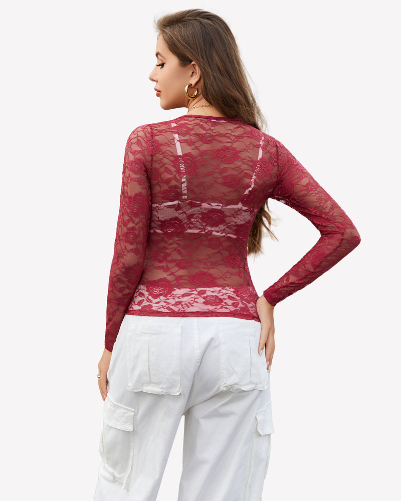 Burgundy mesh sheer floral lace shirt with floral embroidery, paired with white pants.