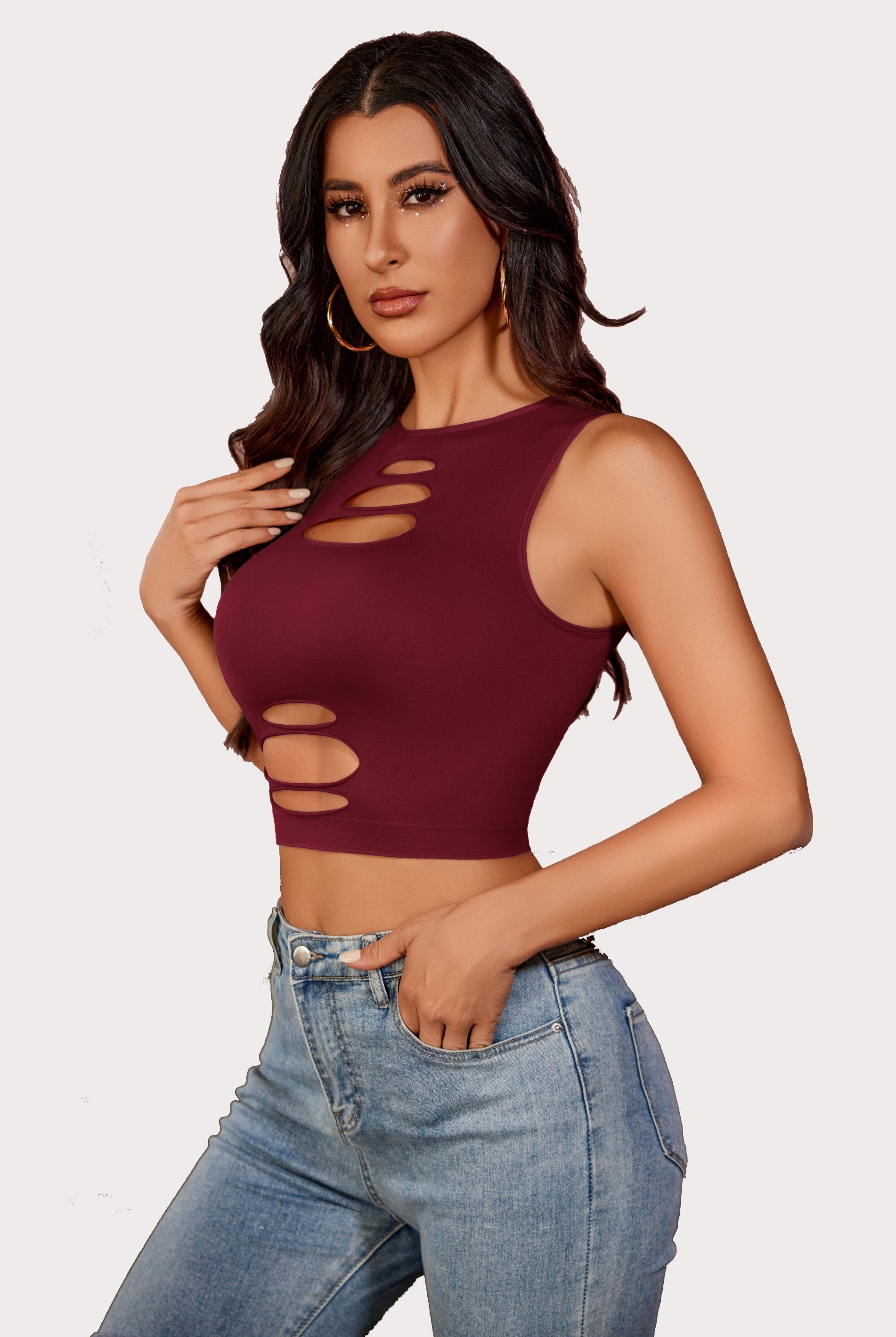 Burgundy cut-out crop top with denim jeans, fashionable and sexy for women. Fishnet crop top.