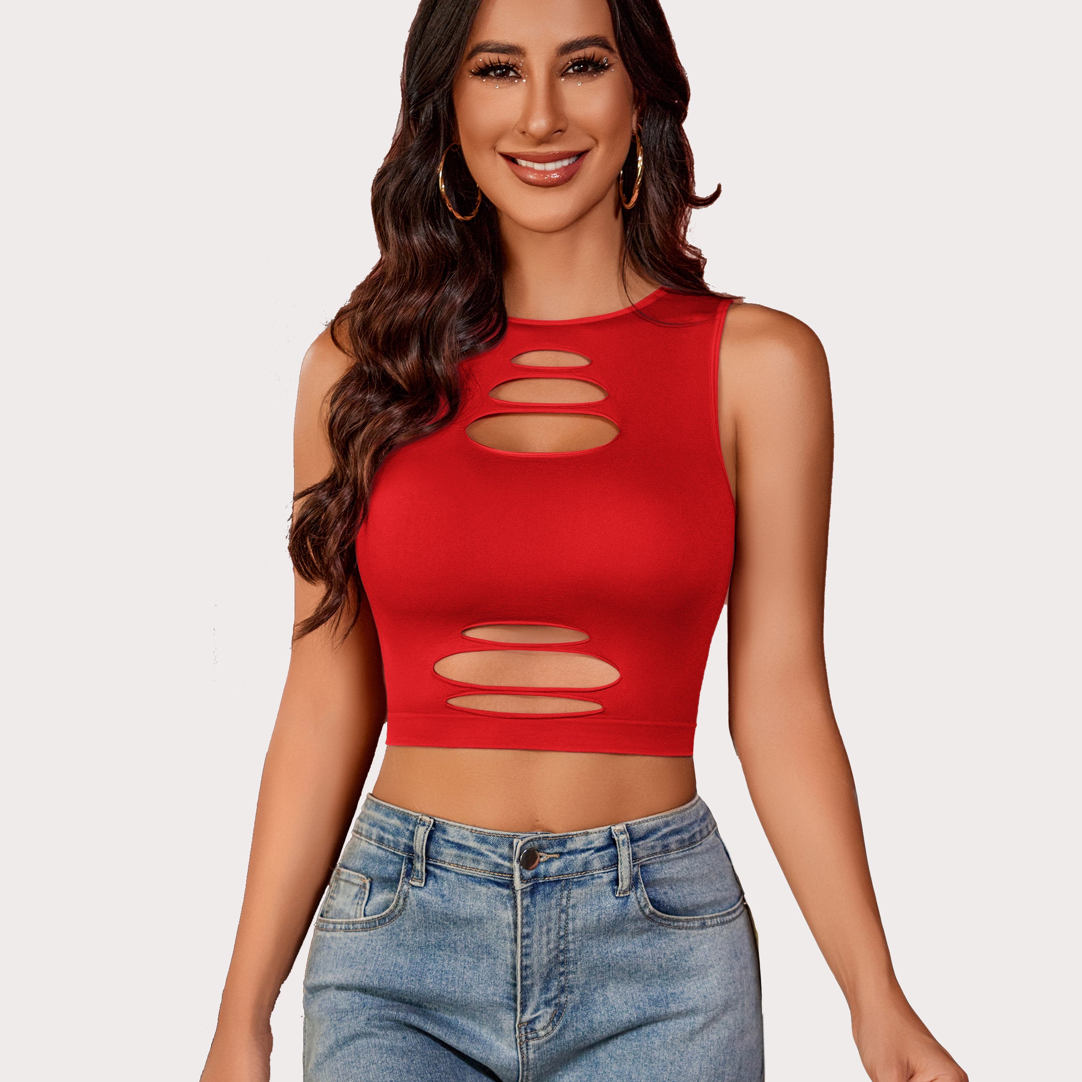 Red cut-out crop tank top with denim shorts, showing attractive curves. Fishnet crop top design.