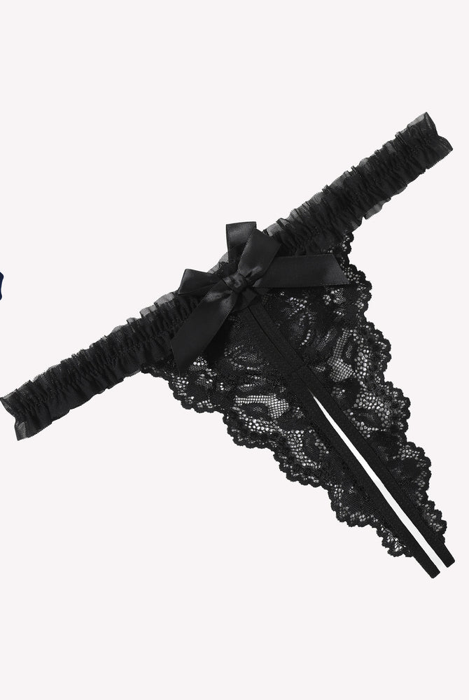 Black floral lace panties with bow and ruffle trim. Sexy lace lingerie for a confident look.