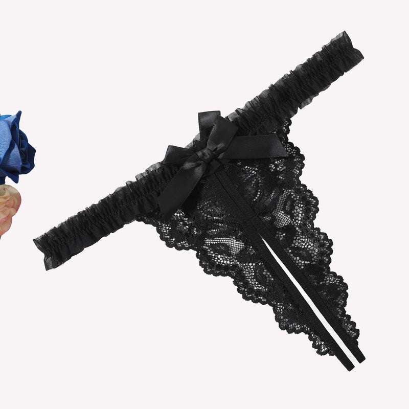 Black floral lace panties with bow and ruffle trim. Sexy lace lingerie for a confident look.