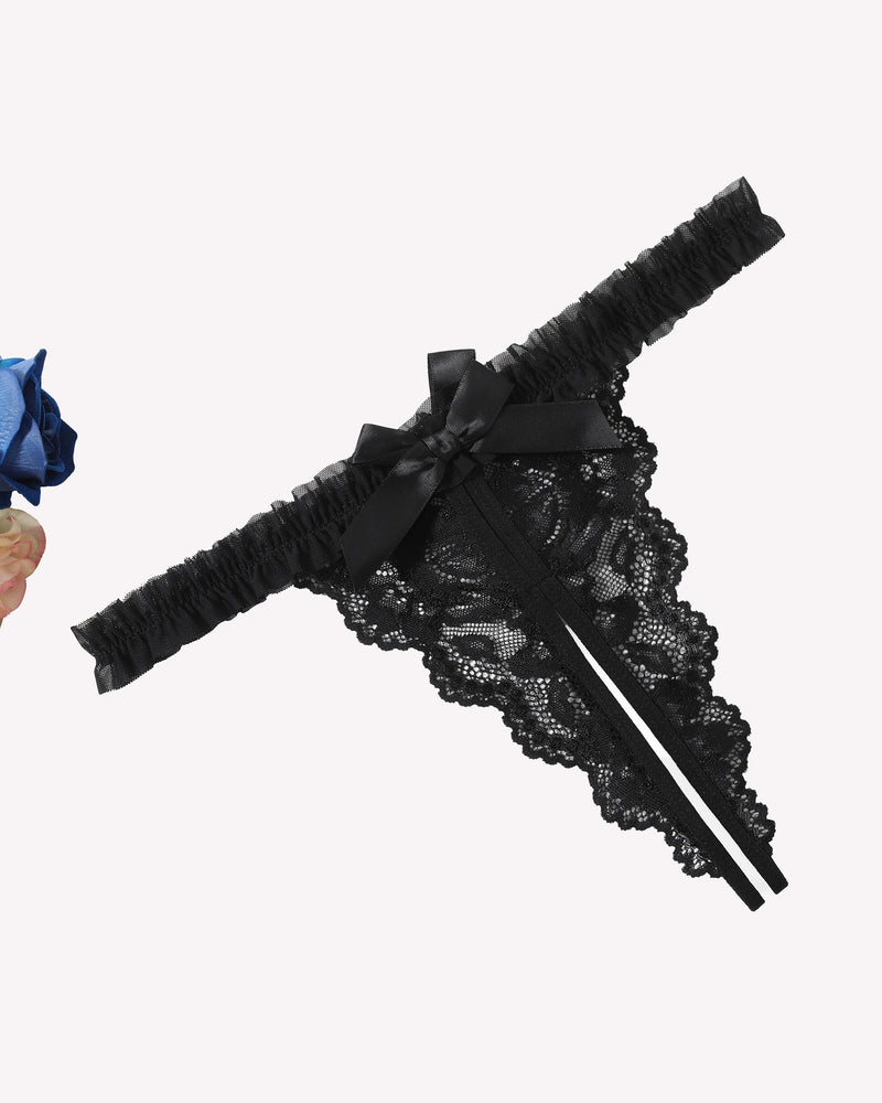 Black floral lace panties with bow and ruffle trim. Sexy lace lingerie for a confident look.