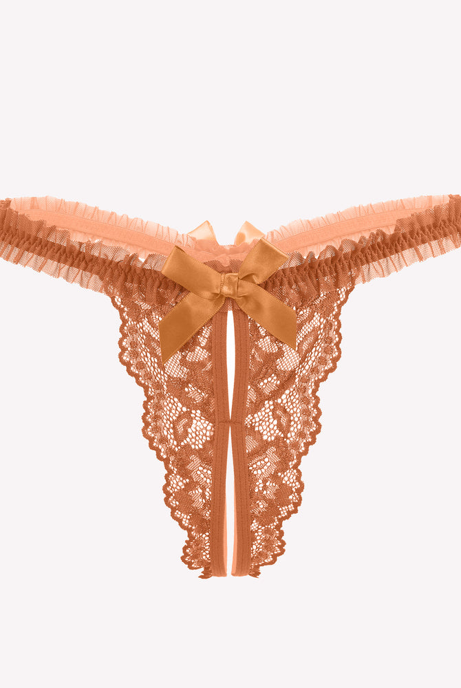 Apricot floral lace panties with bow and ruffle trim. Sexy lingerie for a confident look