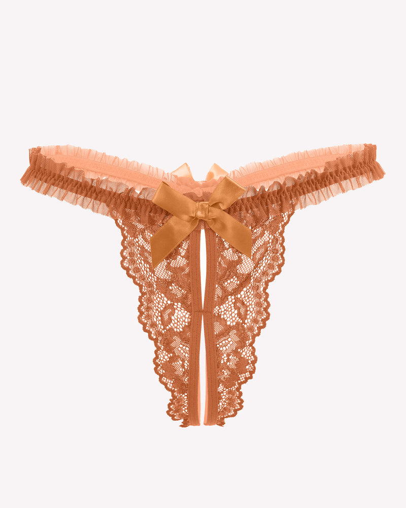 Apricot floral lace panties with bow and ruffle trim. Sexy lingerie for a confident look