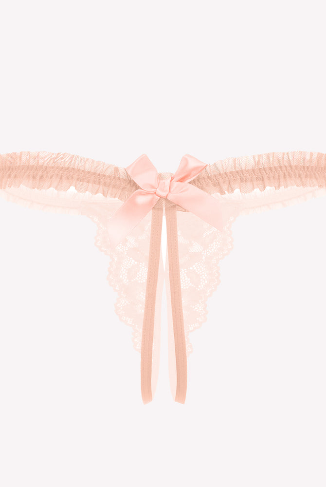 Peach floral lace thong panties with bow and ruffle trim. Sexy lingerie for a confident look.