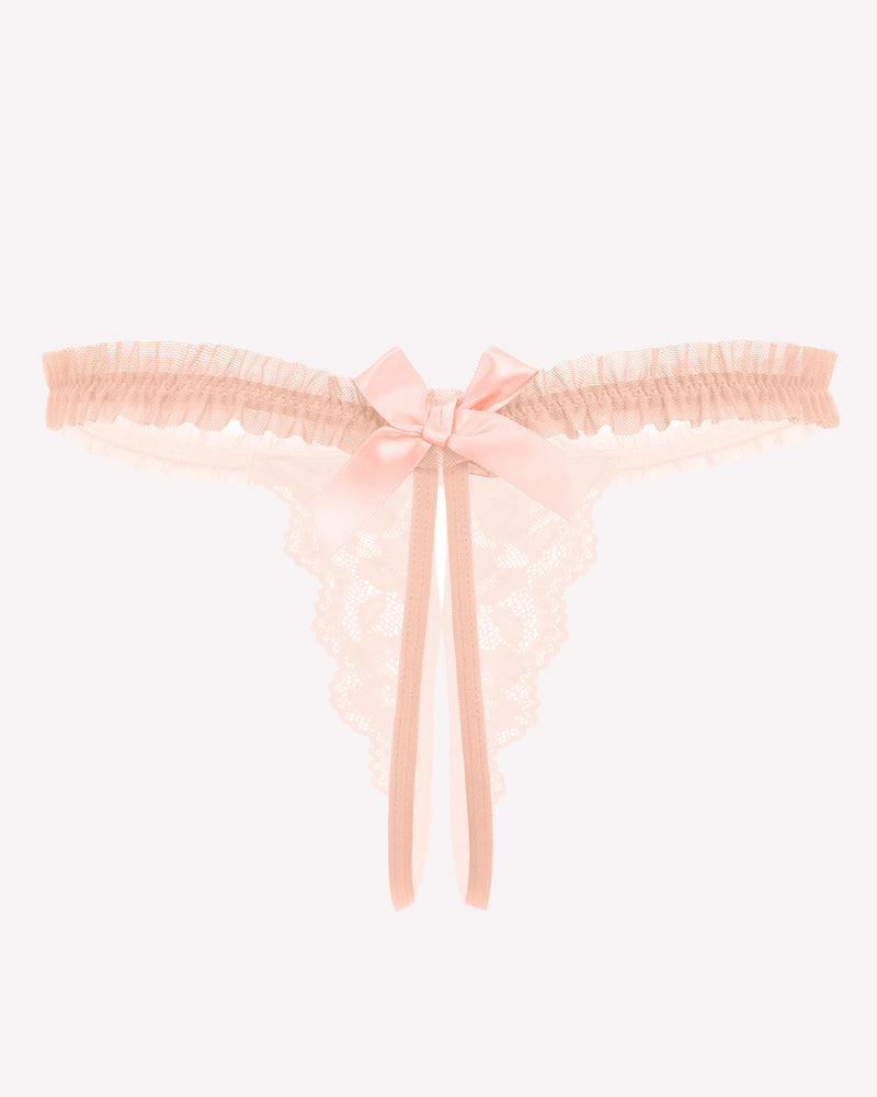 Peach floral lace thong panties with bow and ruffle trim. Sexy lingerie for a confident look.