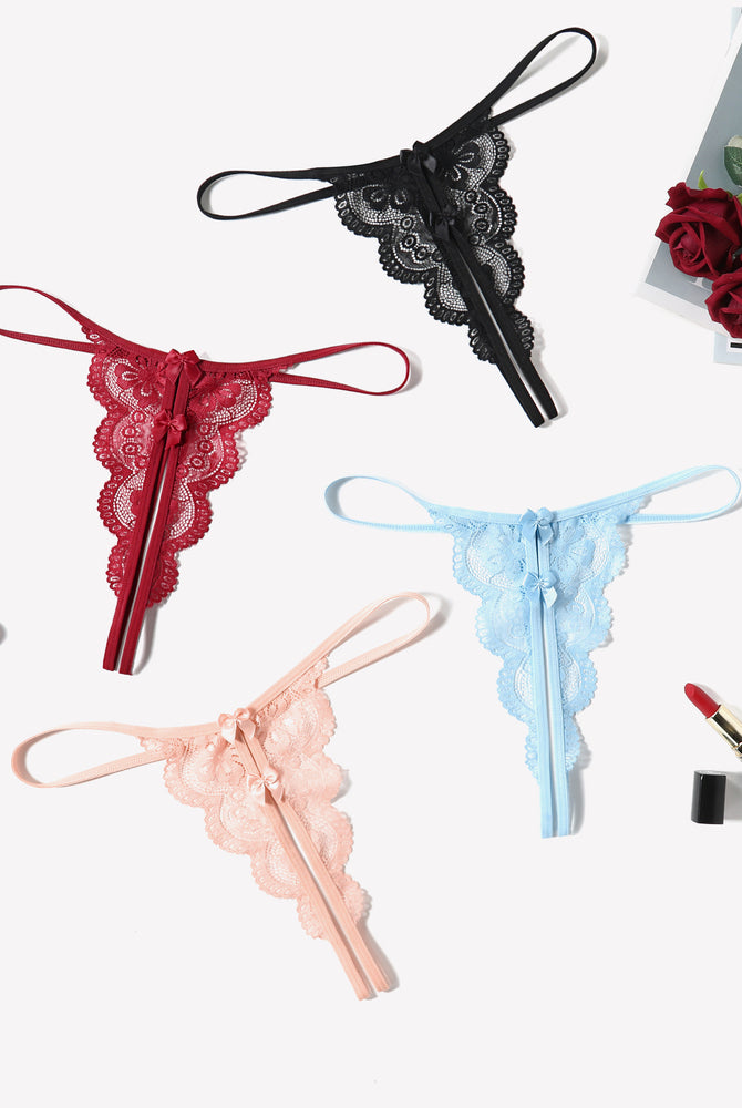 Lace thongs in various colors. Low rise bow panties. Sexy lingerie.