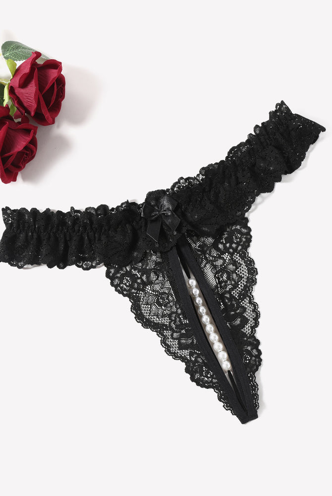Black lace thong with pearl accents. Sensual low waist design. Comfortable and sexy lingerie.