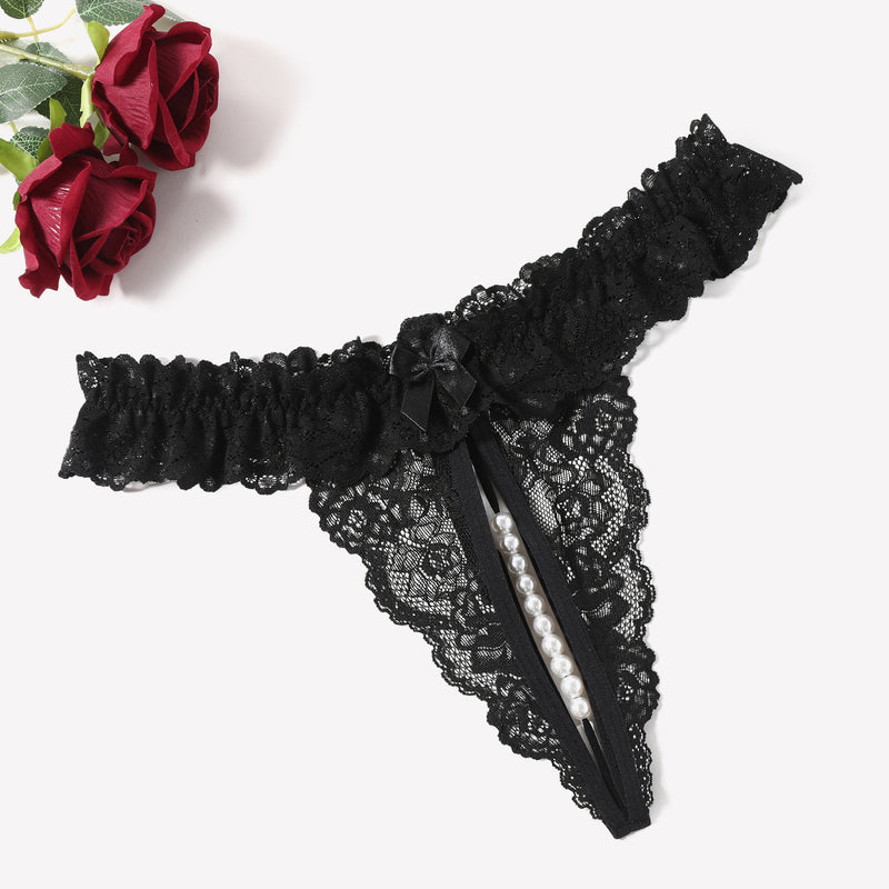 Black lace thong with pearl accents. Sensual low waist design. Comfortable and sexy lingerie.