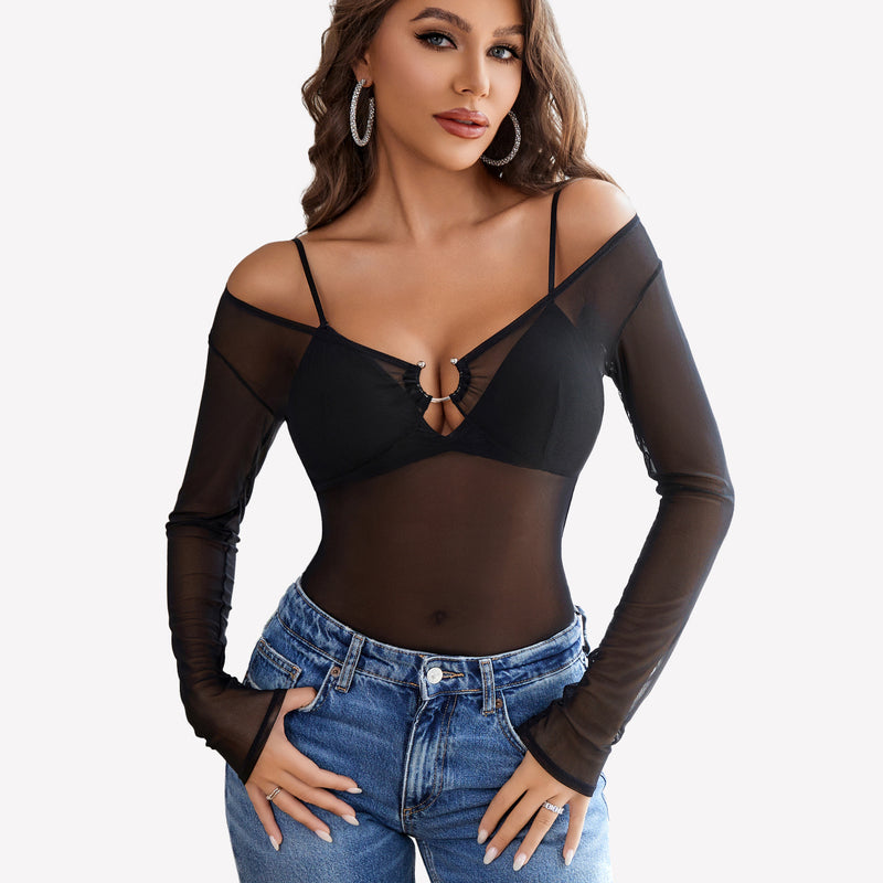 Black mesh long sleeve blouse top with off-shoulder design and ring detail, paired with blue jeans.