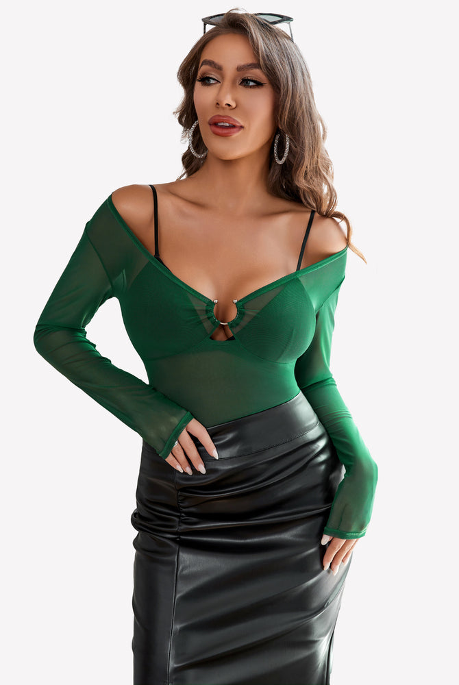 Mesh long sleeve blouse with ring detail, off-shoulder, green; paired with black skirt.