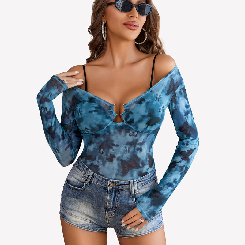 Blue butterfly mesh off-shoulder blouse with ring detail and denim shorts; sexy and stylish.