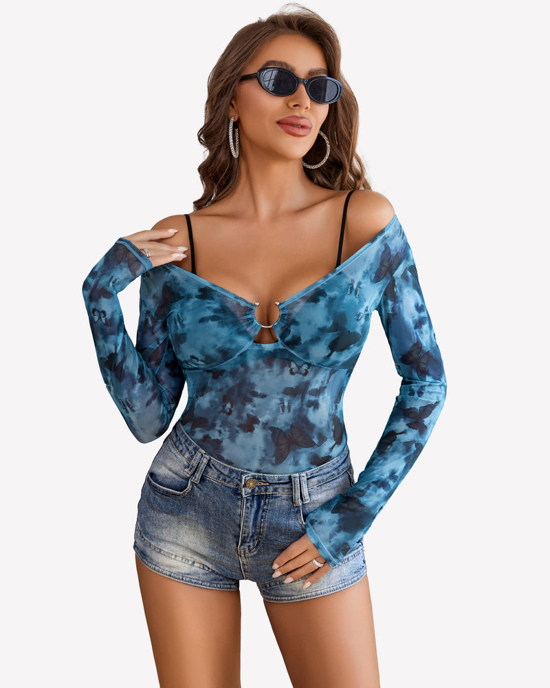 Blue butterfly mesh off-shoulder blouse with ring detail and denim shorts; sexy and stylish.