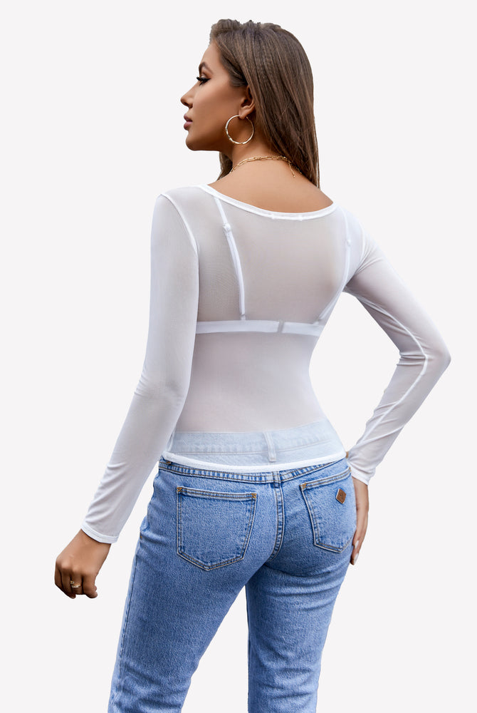 White mesh long sleeve blouse with scoop neck, paired with blue jeans; sexy and stylish.