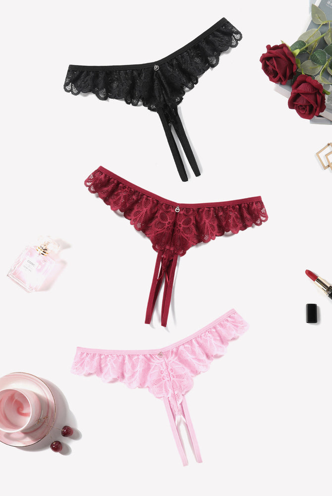 Criss-cross lace thong briefs in black, burgundy, and pink