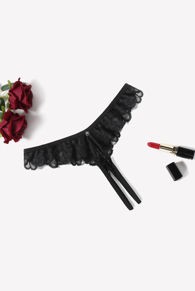 Black lace thong briefs with criss-cross design and ruffle trim, perfect for special occasions