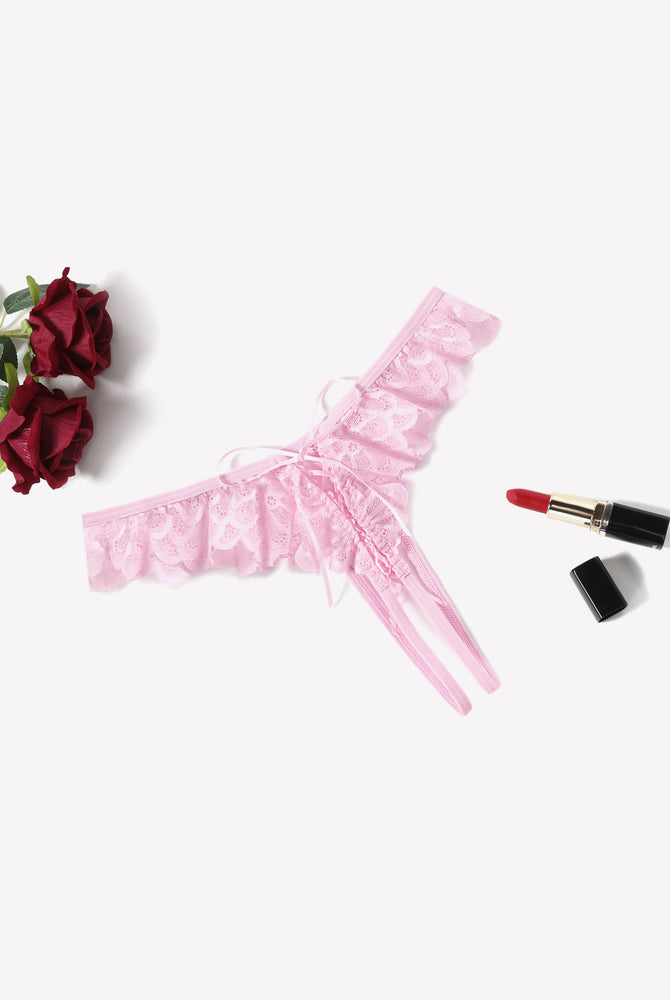 Pink lace thong with criss-cross design and floral lace. Sexy lingerie for special occasions.