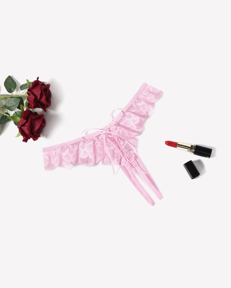 Pink lace thong with criss-cross design and floral lace. Sexy lingerie for special occasions.