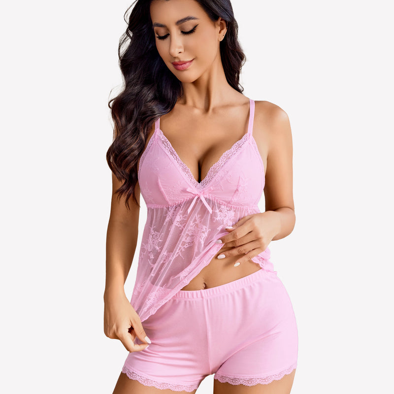 Pink lace cami pajama set with shorts, adjustable straps, and bow decor for sexy sleepwear