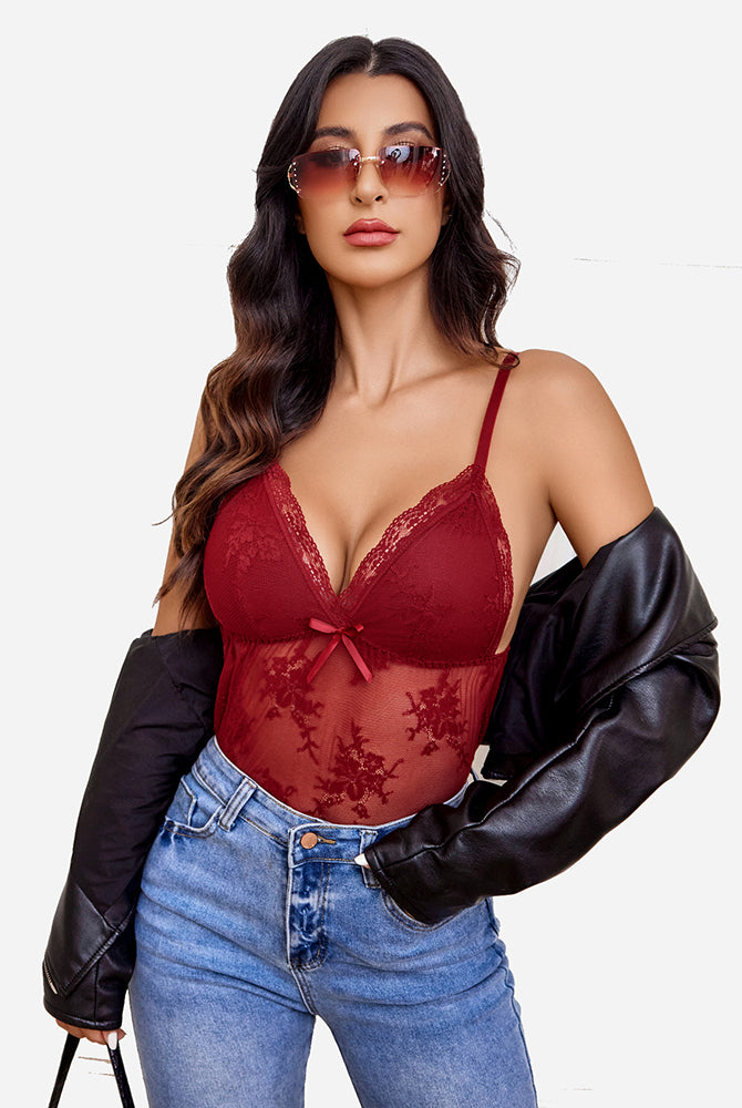 Burgundy lace bodysuit with bow detail, blue jeans, and black jacket, sexy sleepwear