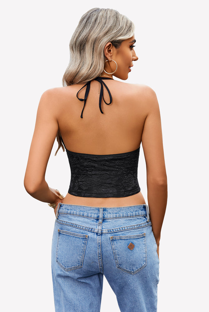 Black lace halter crop top with adjustable straps and jeans. Y2k style lingerie.