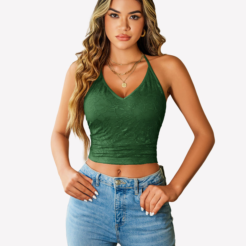 Green lace halter crop top with adjustable straps, paired with light wash jeans. Y2k style.